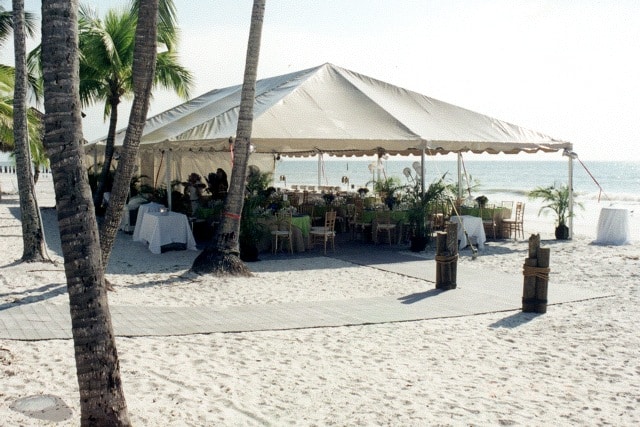 Beachside tented wedding setup by Creative Events